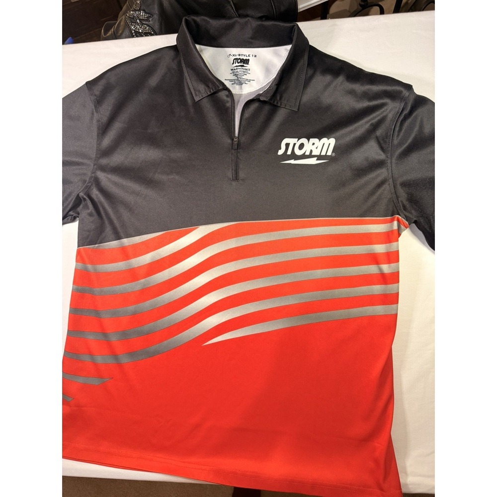 Storm The Bowler's Company black and orange 1/4 Zip Coolwick  Jersey Men's